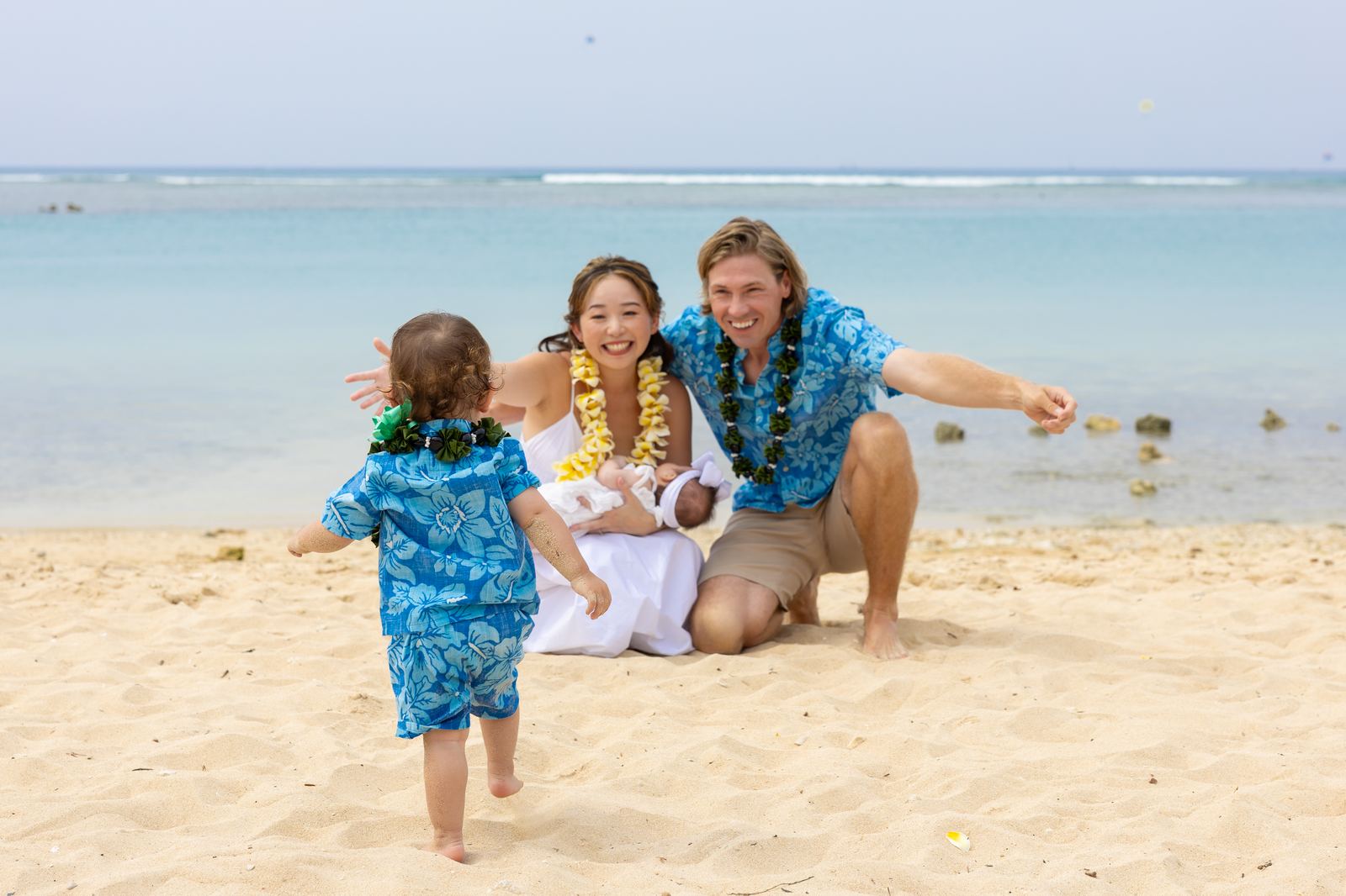 Family on Waikiki Beach during a daytime beach session